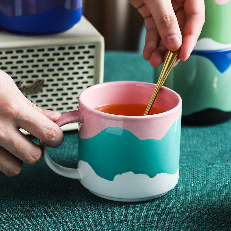 Girl is stirring tea in Stackable Ceramic Coffee Mug